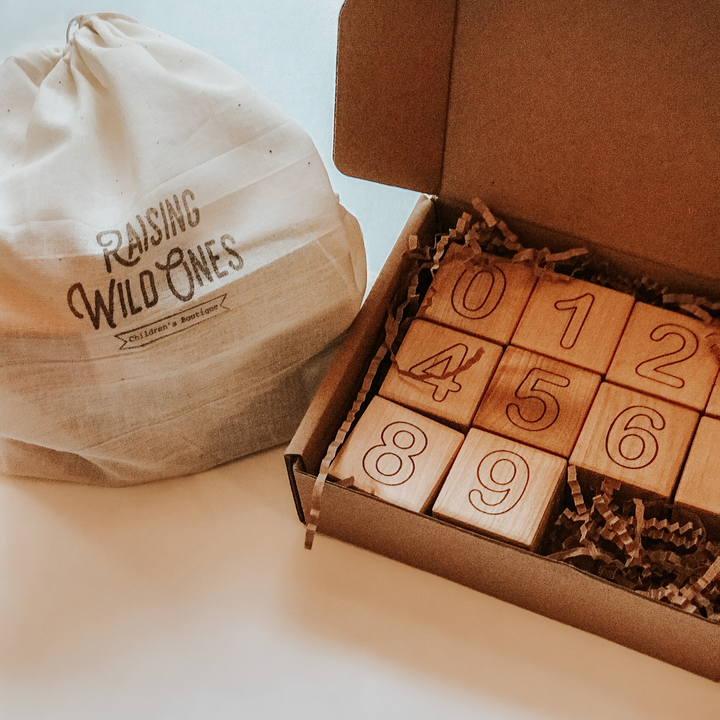 Wooden blocks engraved with numbers 0 through 9